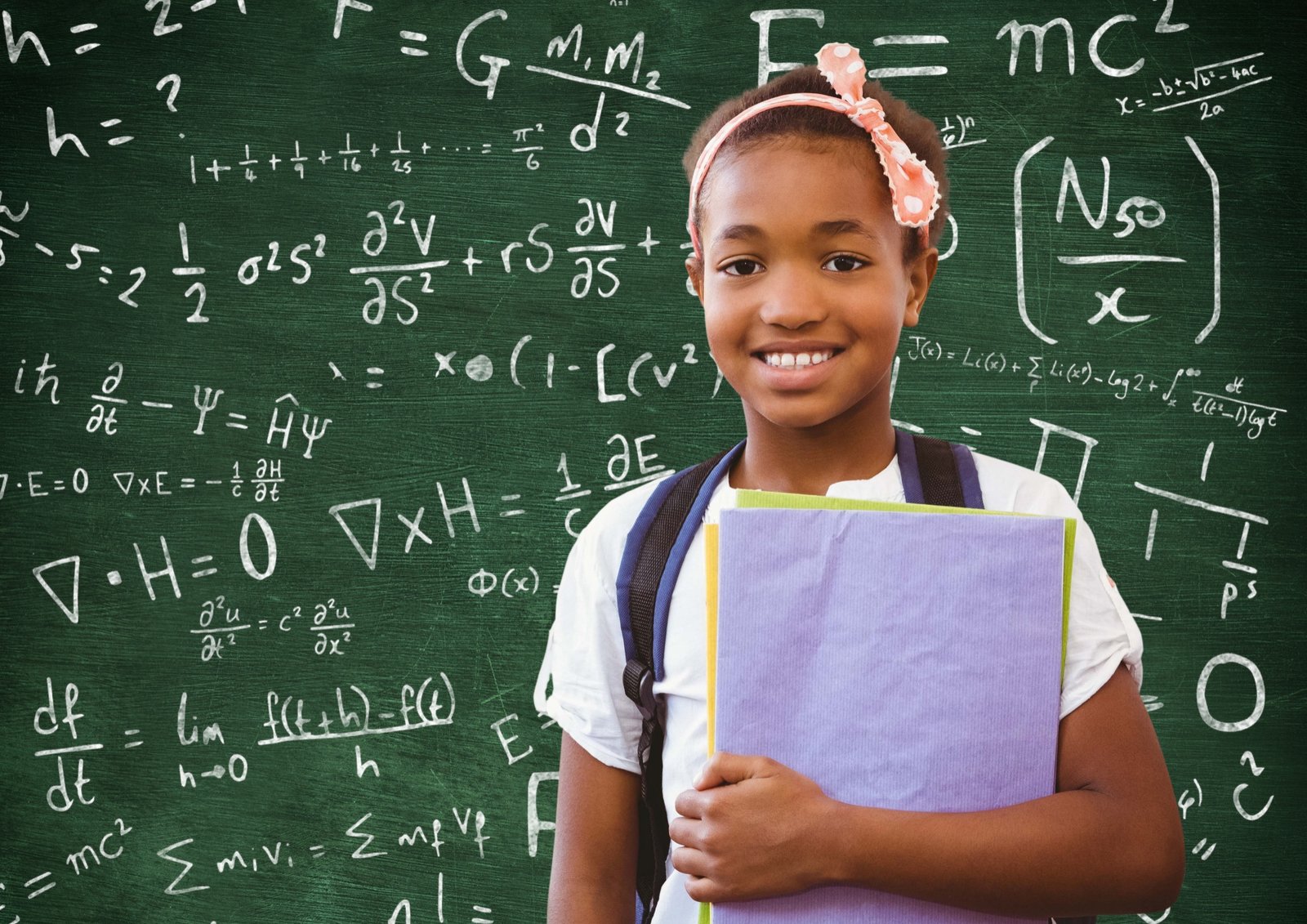 A learner holding her books